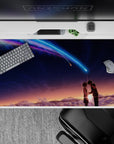 40x20 inches anime desk pad in warm sunset fading to midnight, neon blue-violet comet, dreamy clouds.