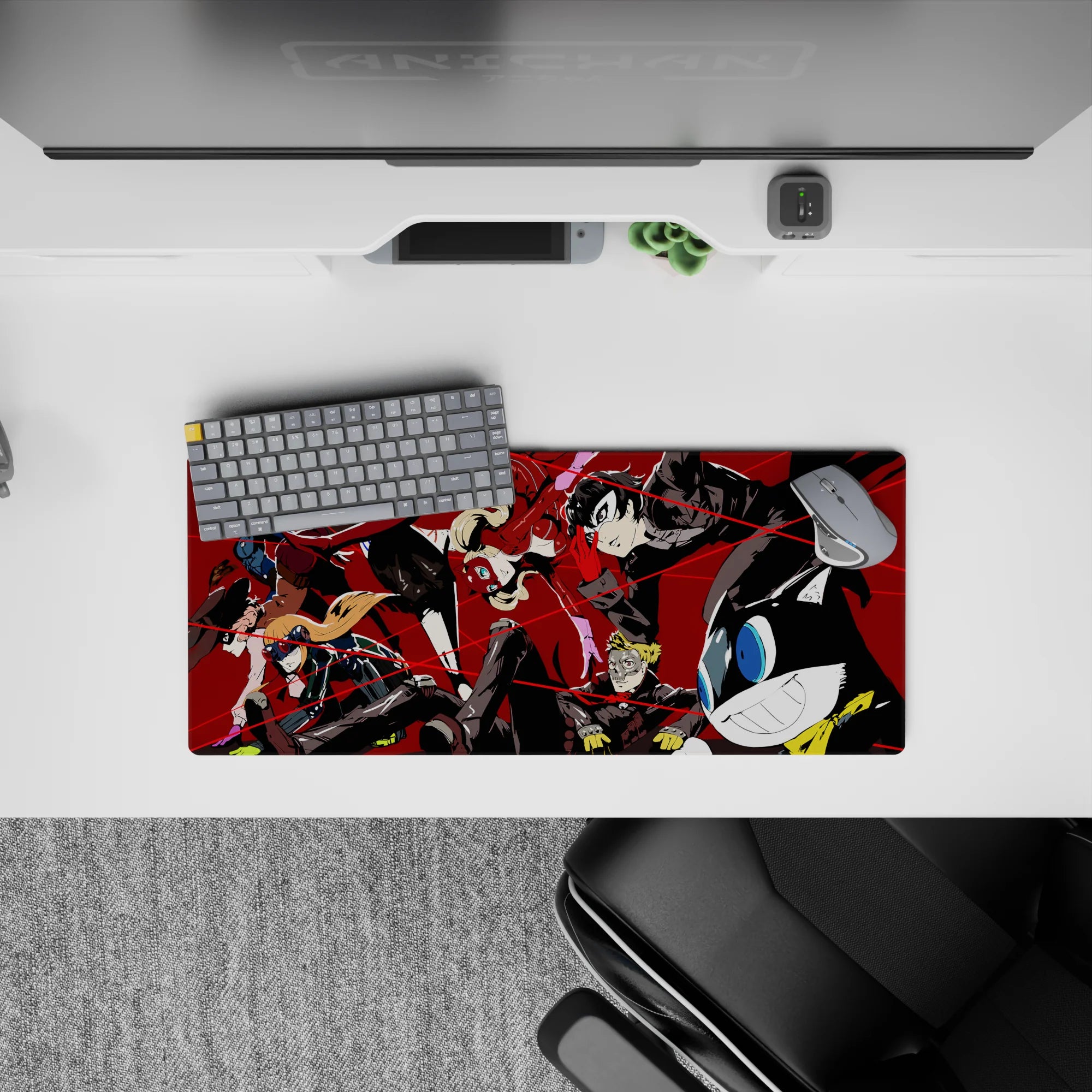 Anime mouse pad, 28x12 inches, featuring Persona 5&#39;s Joker, Panther, and Mona in a dynamic heist scene with vibrant colors.